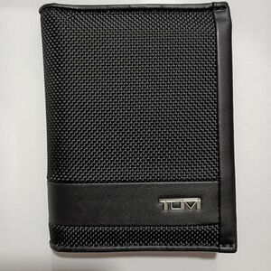 L fold tumi mens wallet brand new. never used. price tag included
